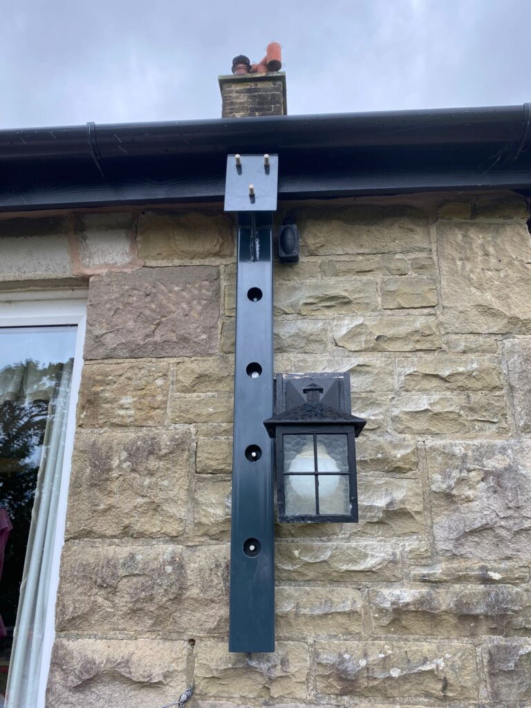 cladding and stone bracket